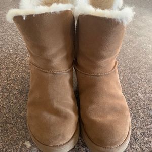 Chestnut Ugg’s with leather straps on side